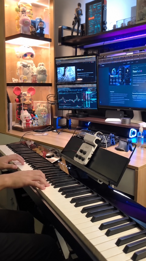 Ray playing Canon in C Major on piano in a home studio